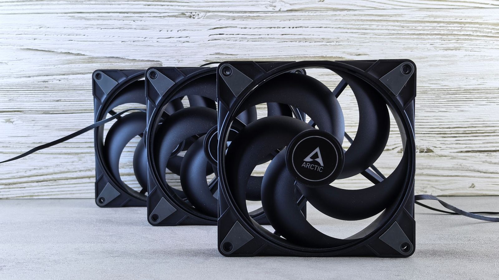 120mm and 140mm case fans mounted inside a PC chassis