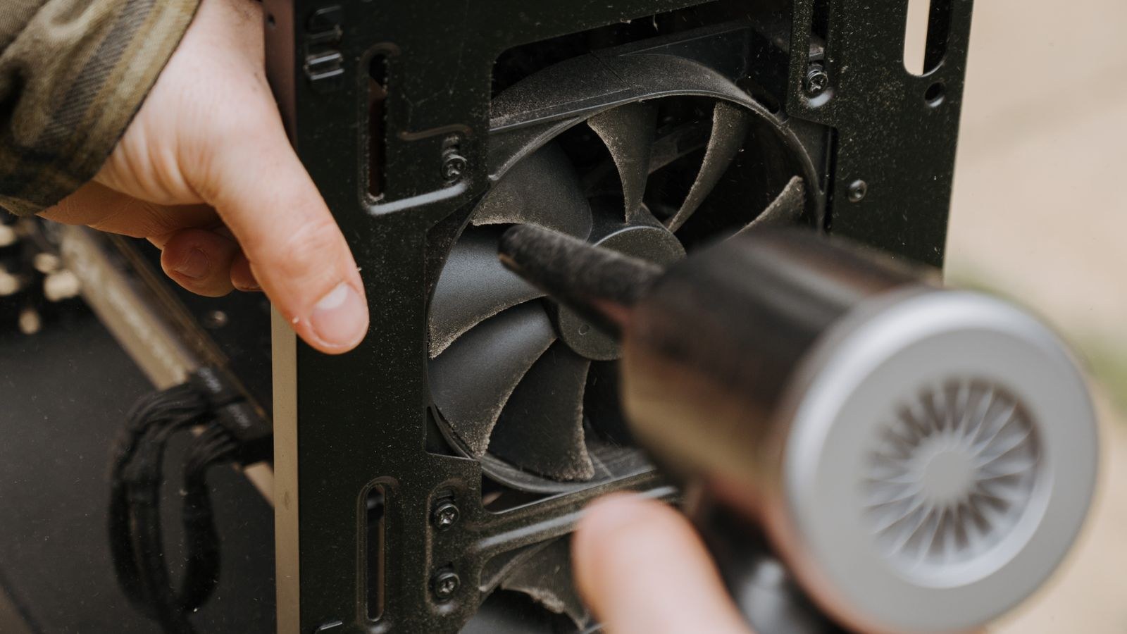 Large case fan spinning inside a well-ventilated computer build