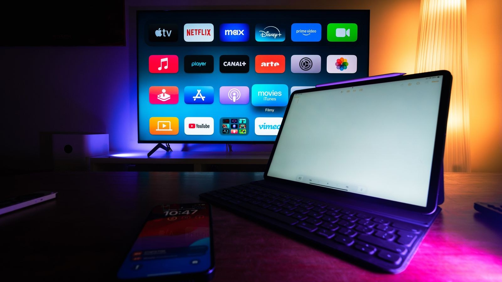 Home setup with a smart TV and tablet showing streaming apps