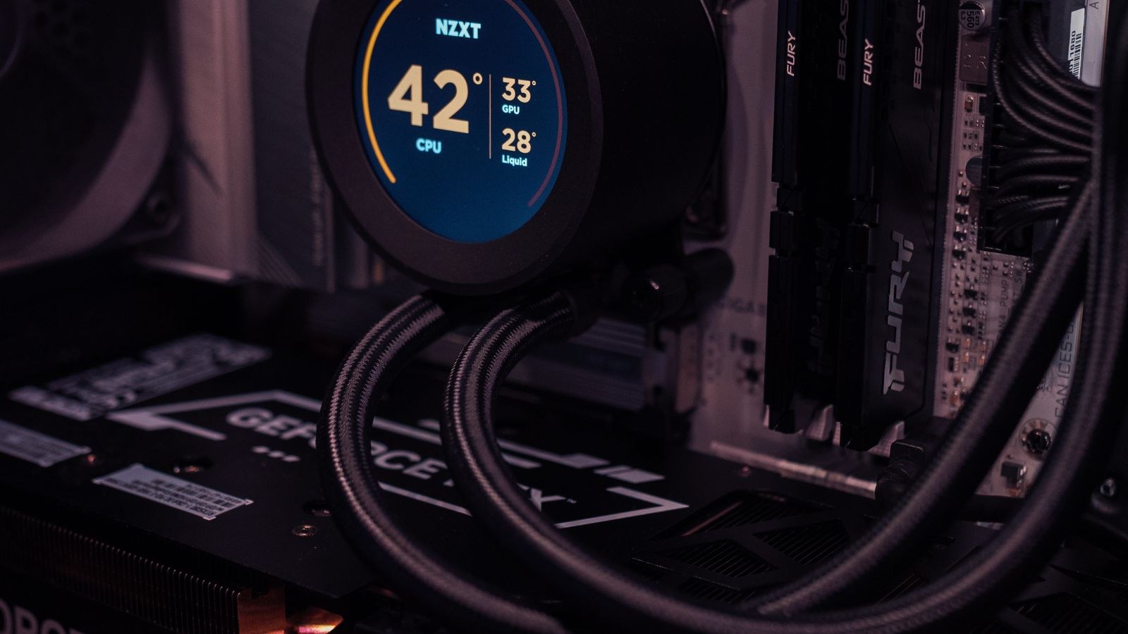 Custom water cooling loop with reservoir and tubing inside a PC