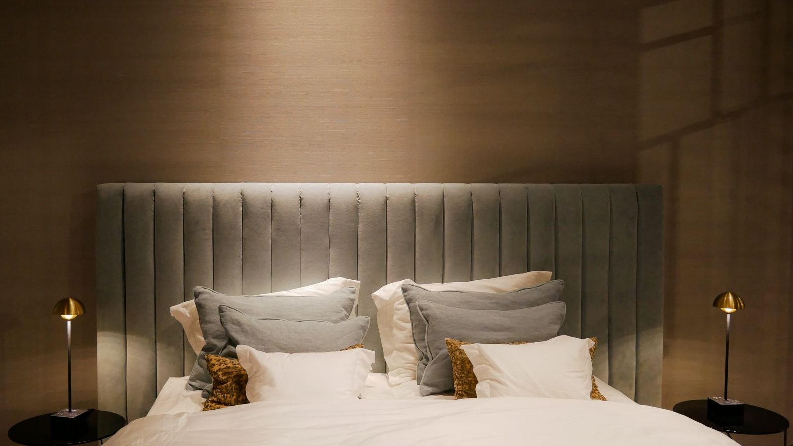 Stylish bedroom with a plush bed and matching bedside lamps