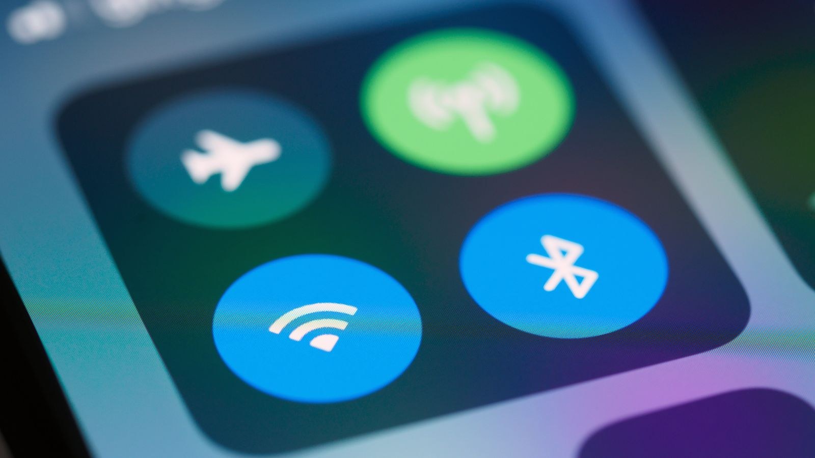 Person checking connected devices in a router app on a smartphone