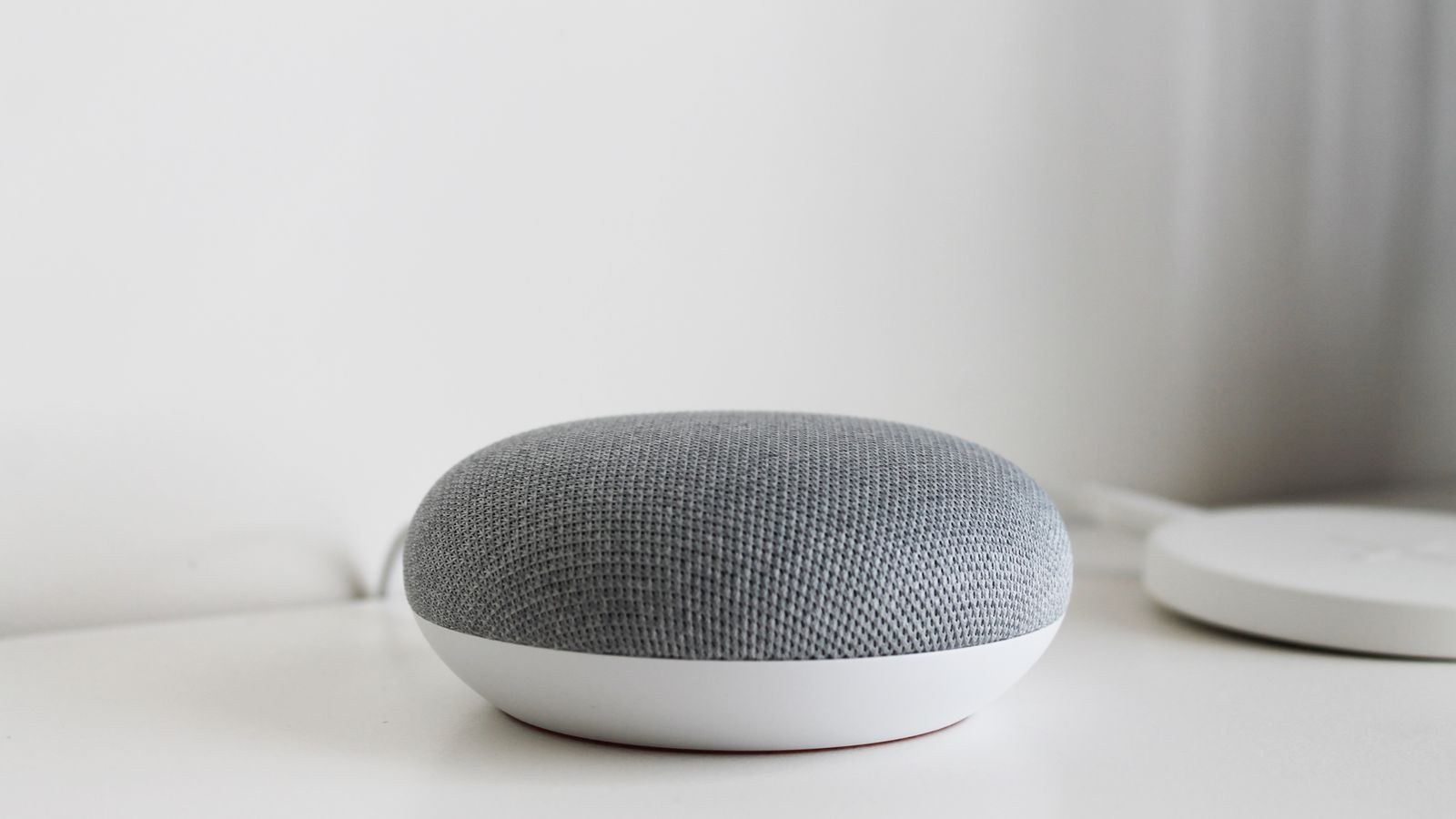 Warm morning light in a bedroom with smart lighting turned on