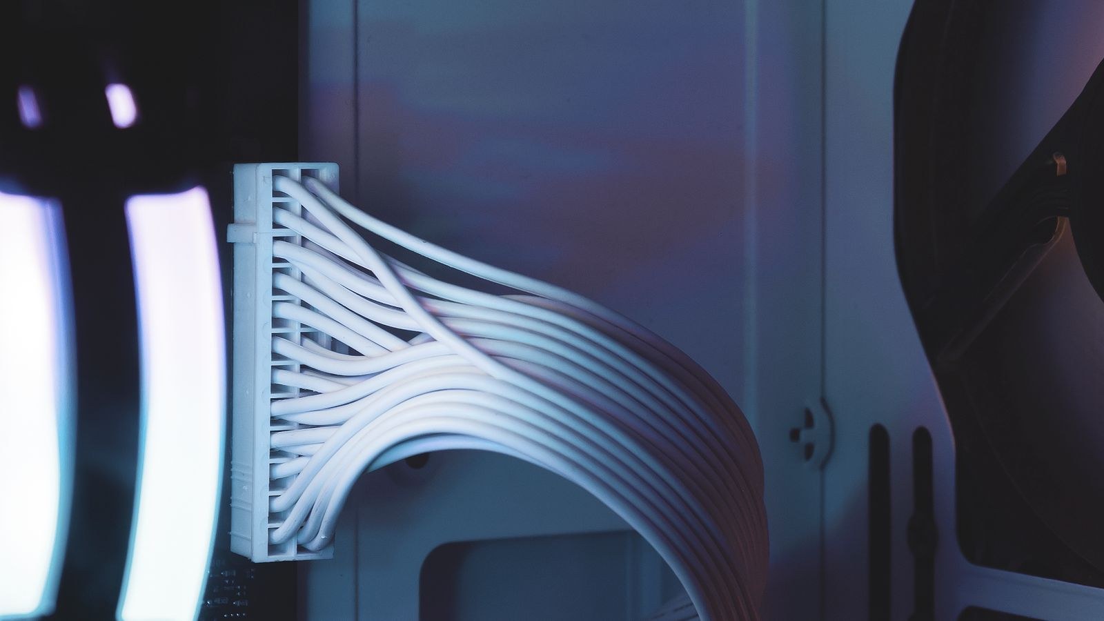 Close up of computer interior components and neatly bundled wiring