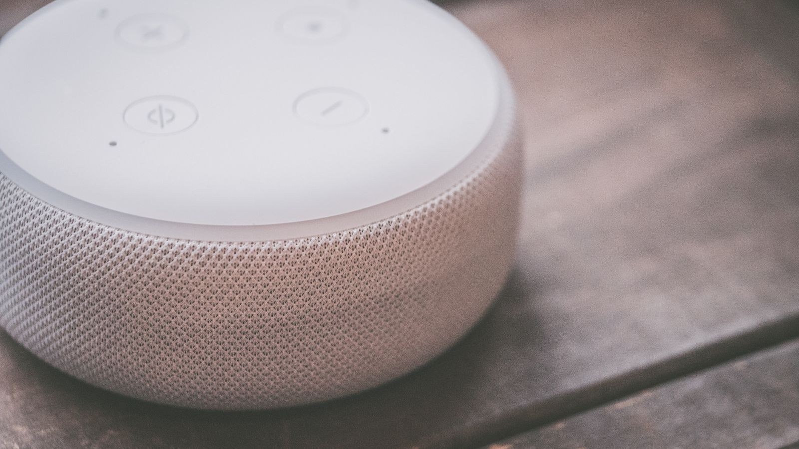 Google smart speaker on a nightstand used for a bedtime routine