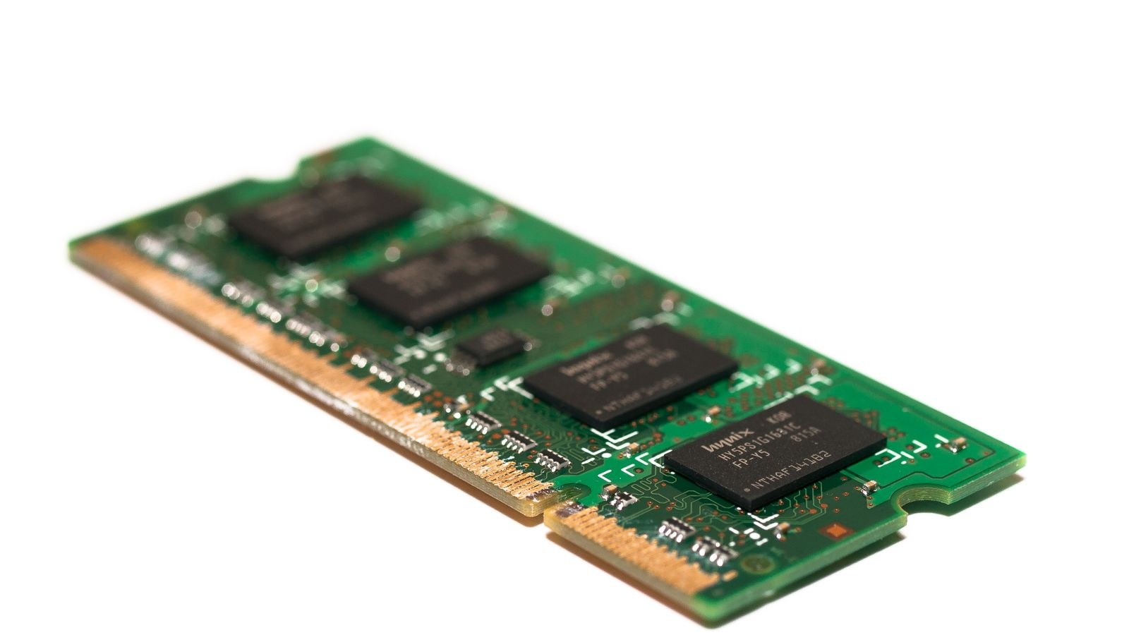 DDR5 memory module being installed into a motherboard slot