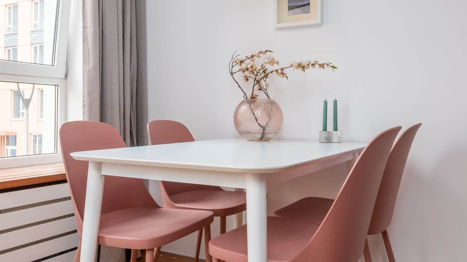 Upholstered fabric dining chairs at a set table