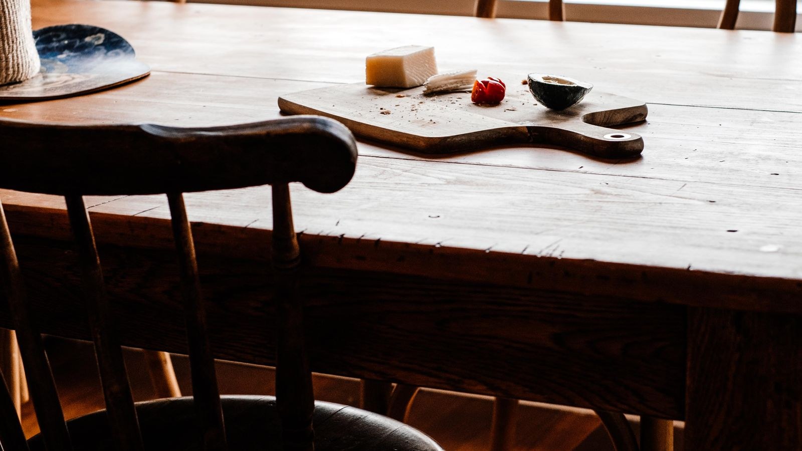 Modern dining chairs with cushioned seats in a dining room