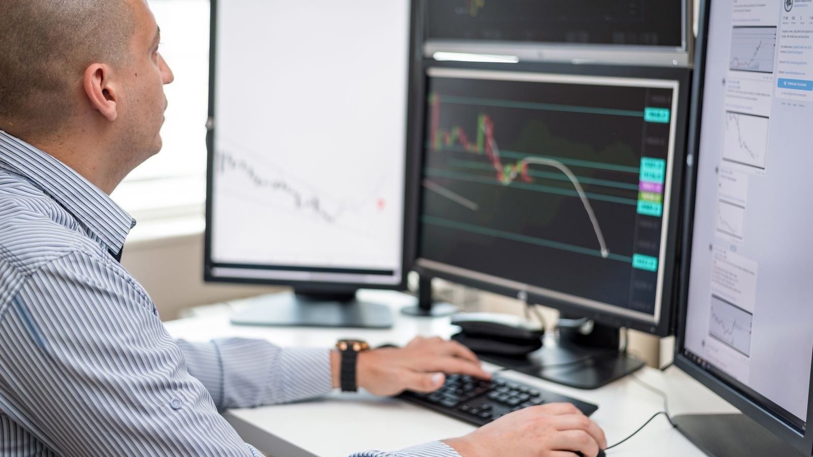 Office worker comparing text sharpness on a high resolution desktop display