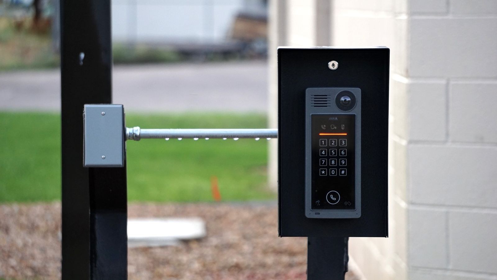 Outdoor doorbell intercom unit mounted at a residential building entrance
