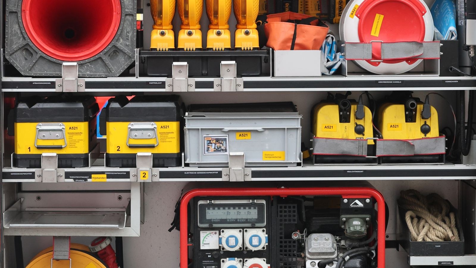 Organized emergency equipment and supplies stored on shelves