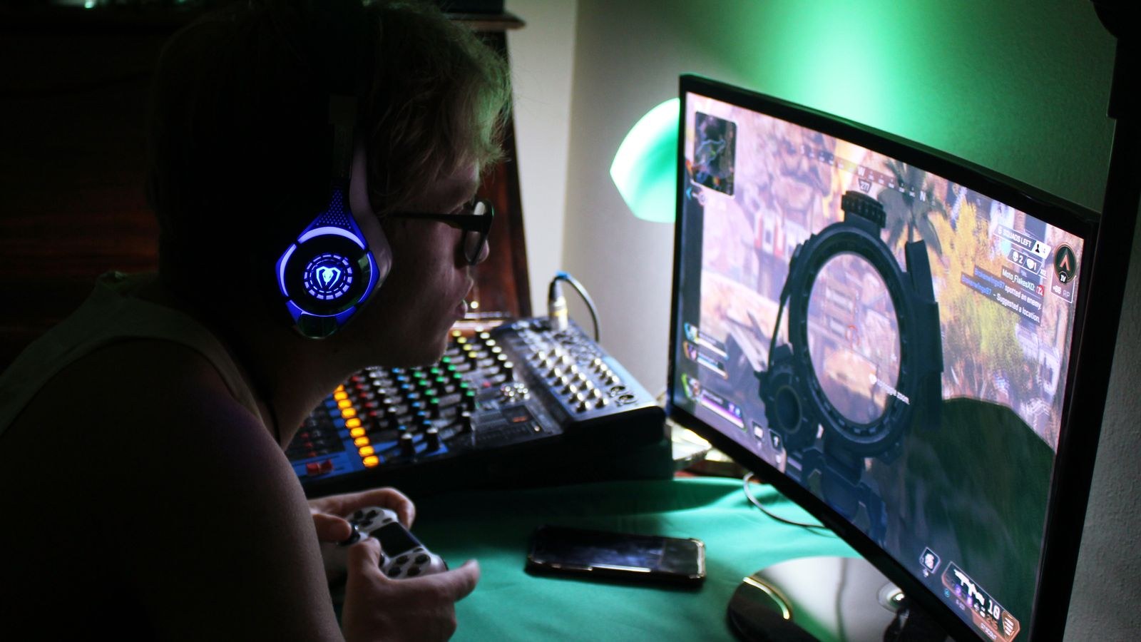Gaming headset connected to a PC audio setup for surround sound configuration