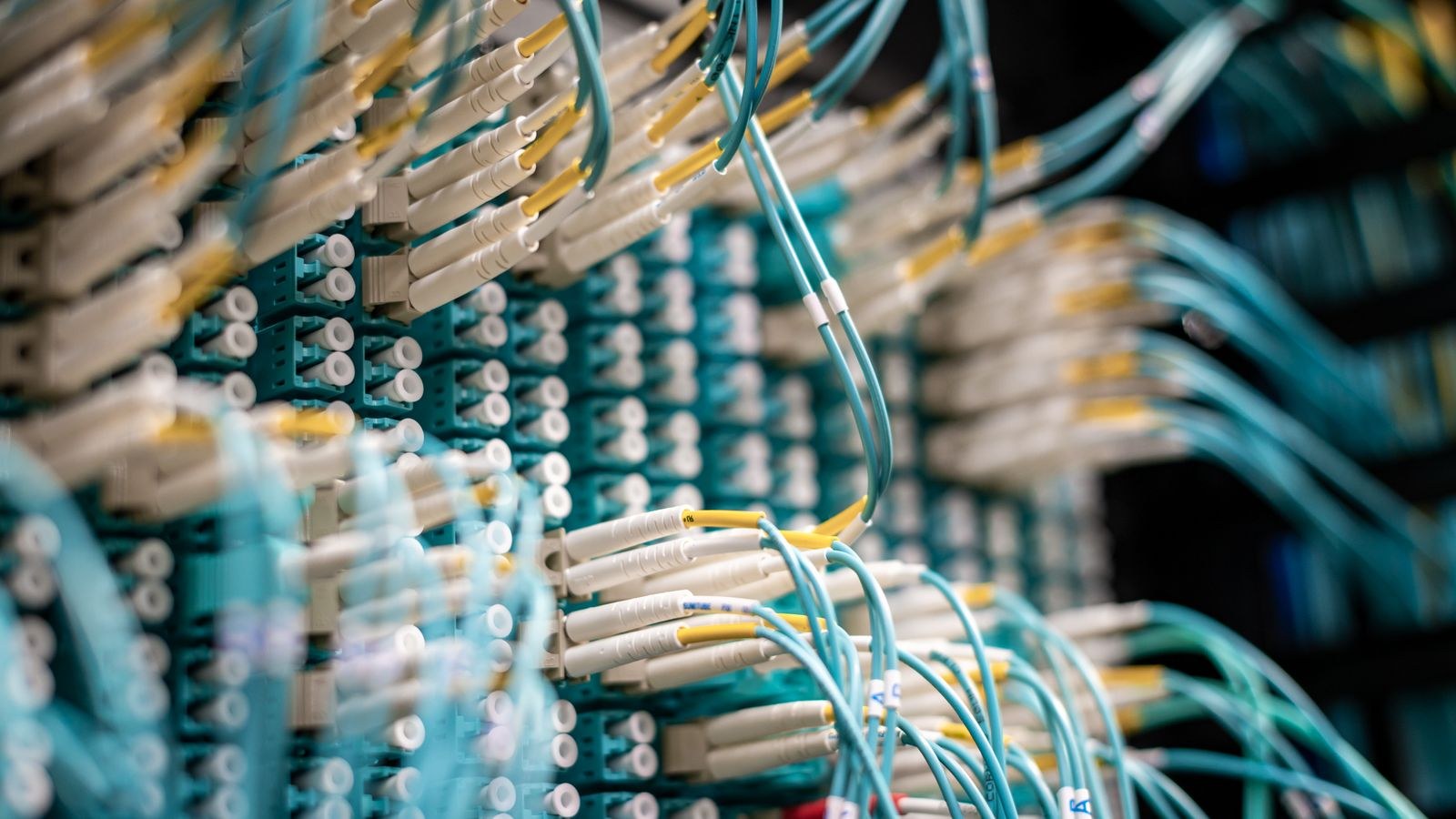 Optical fiber strands carrying broadband data to a home network terminal