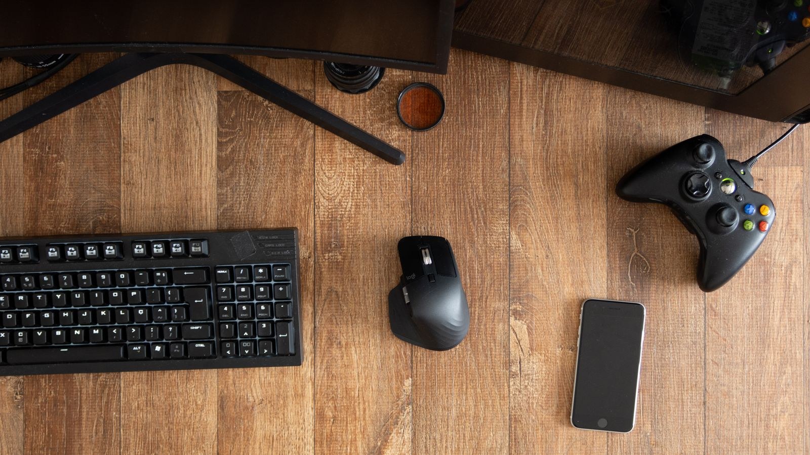 Hand resting on an ergonomic mouse showing palm grip style