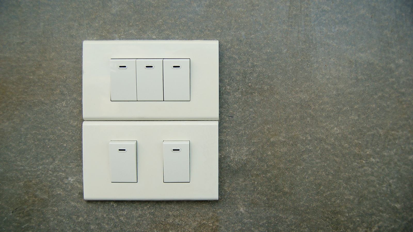 Finished wall switch plate sitting flush after box extender installation