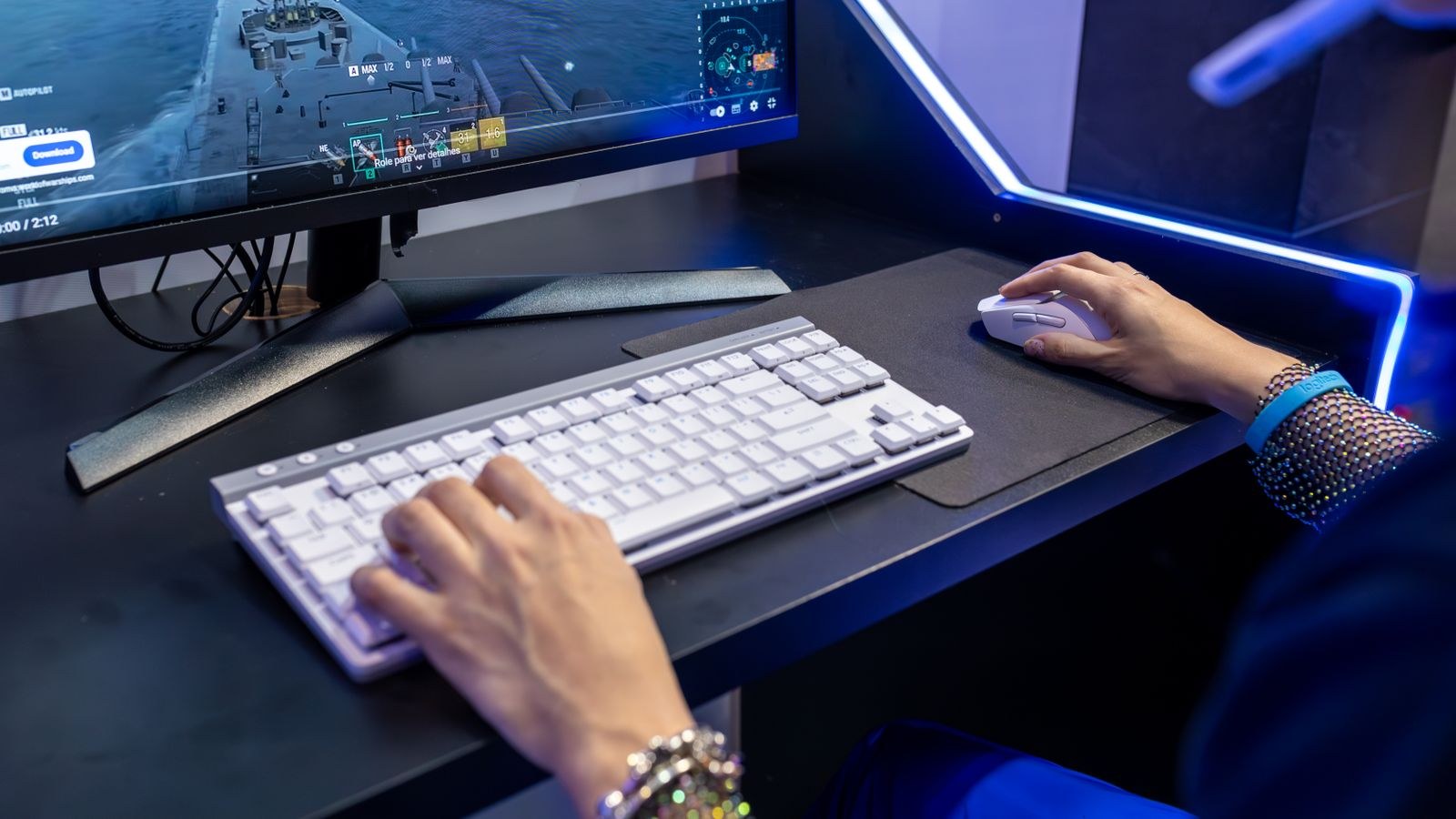 Clean desk setup with a replacement mouse after fixing a double click fault