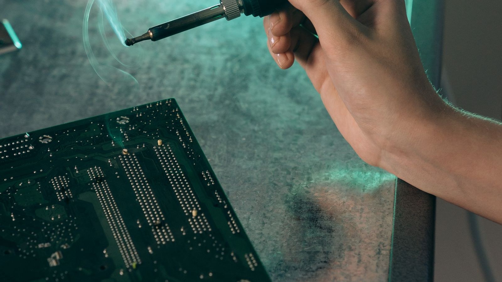 Technician diagnosing a desktop PC that powers on but fails to POST