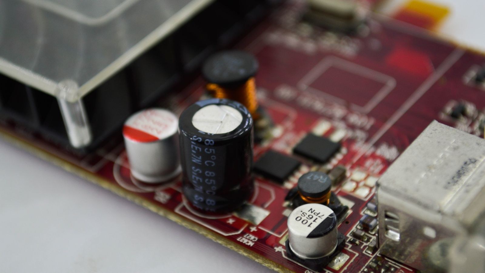 Desktop computer components including RAM and graphics card being reseated on a workbench