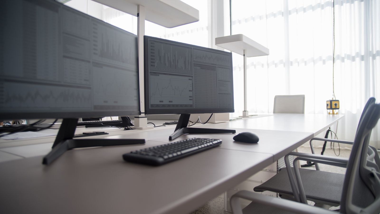 Close up of a high contrast monitor panel showing bright highlights against dark background