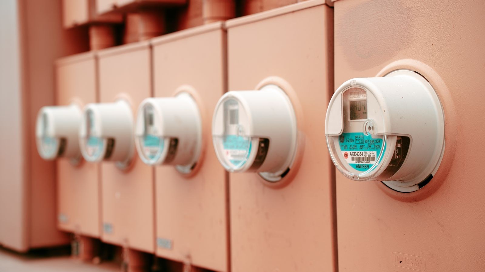 Row of electricity meters used for household power monitoring