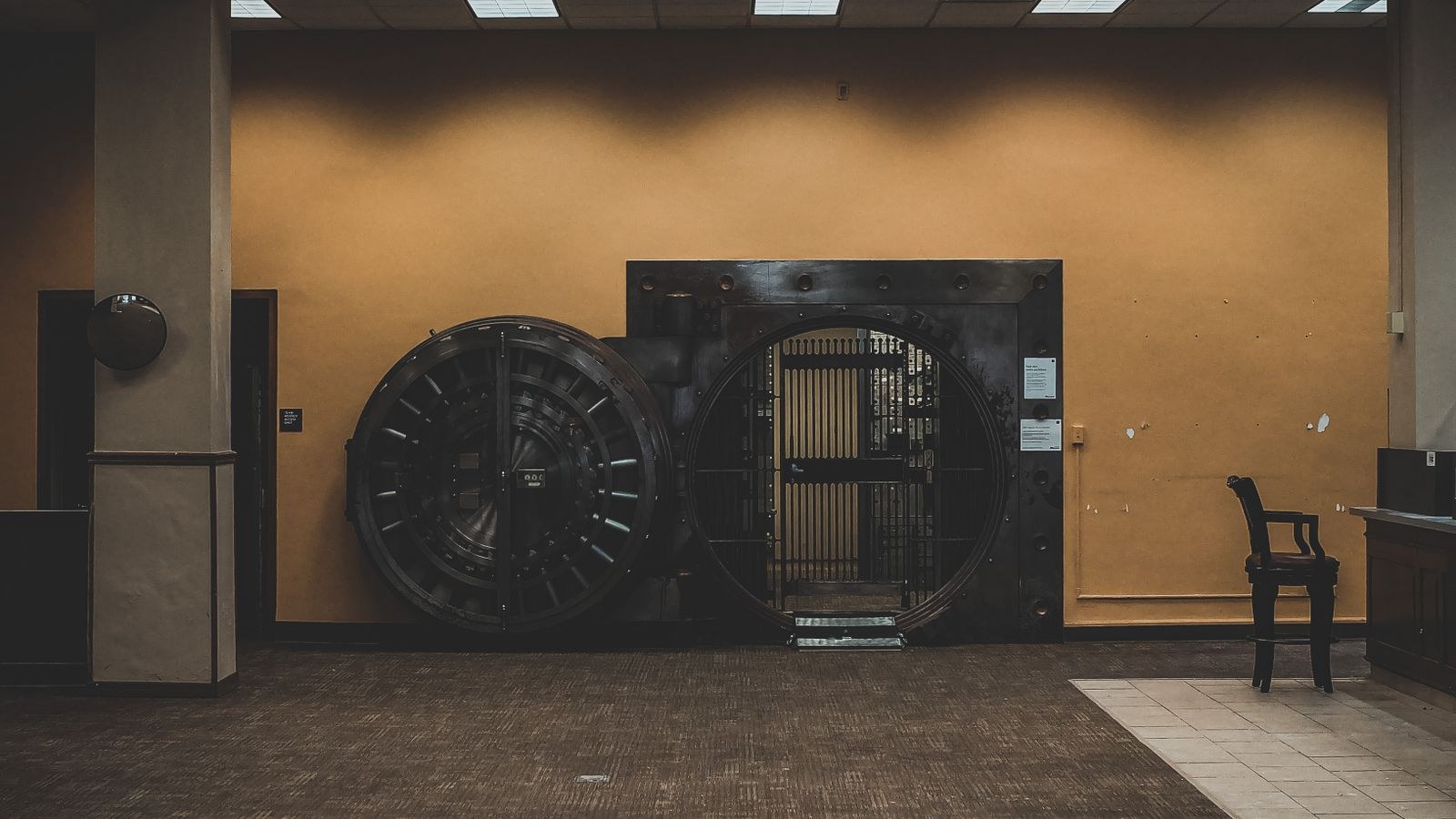 Large open vault door in a secure building interior