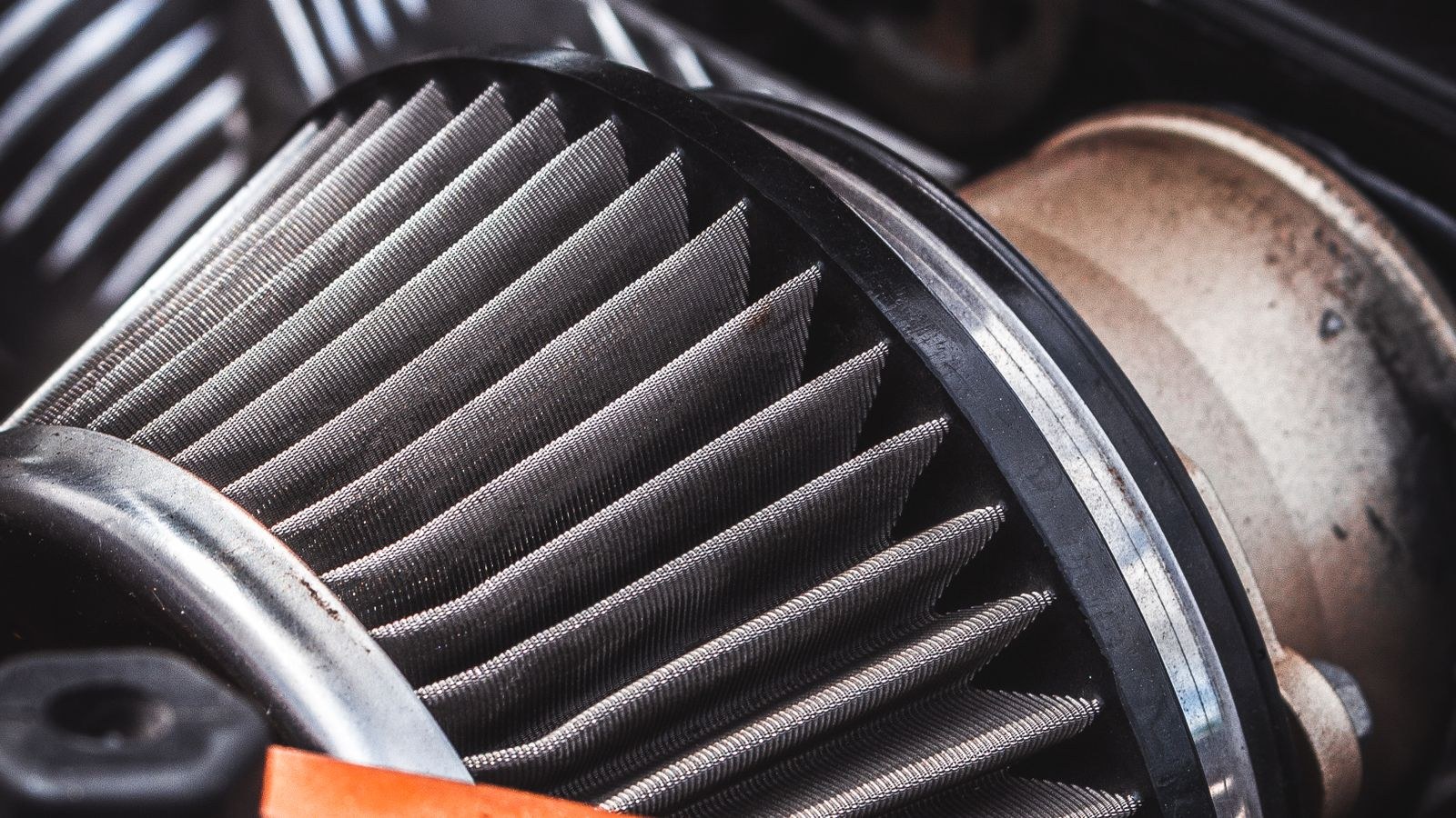 Close up of a pleated air filter showing its folded media and frame