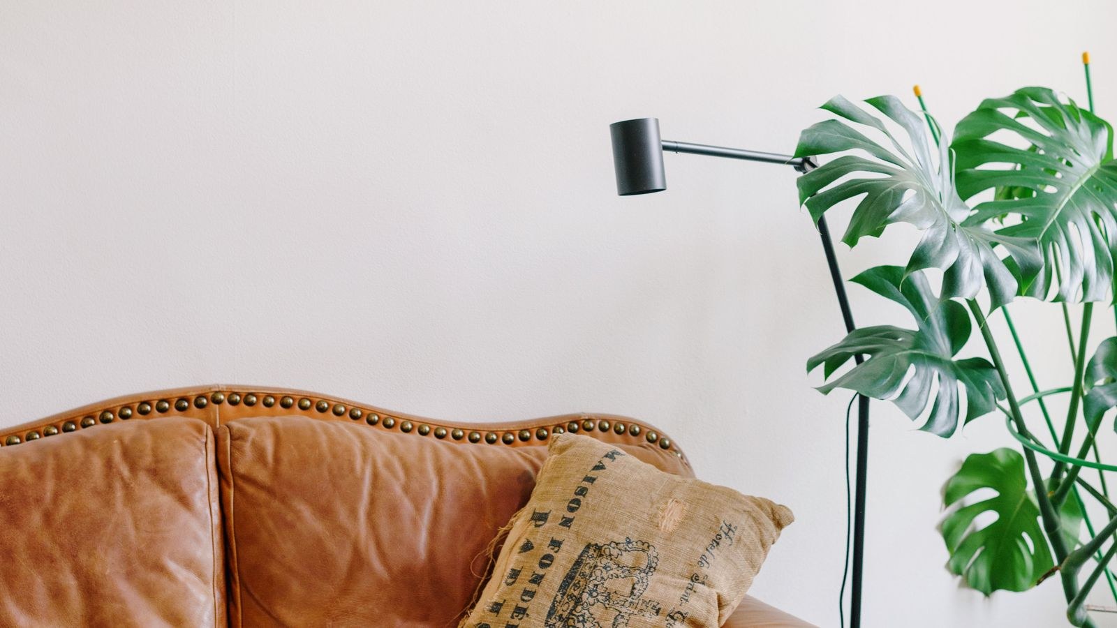 Anchoring living room furniture to the wall for child safety