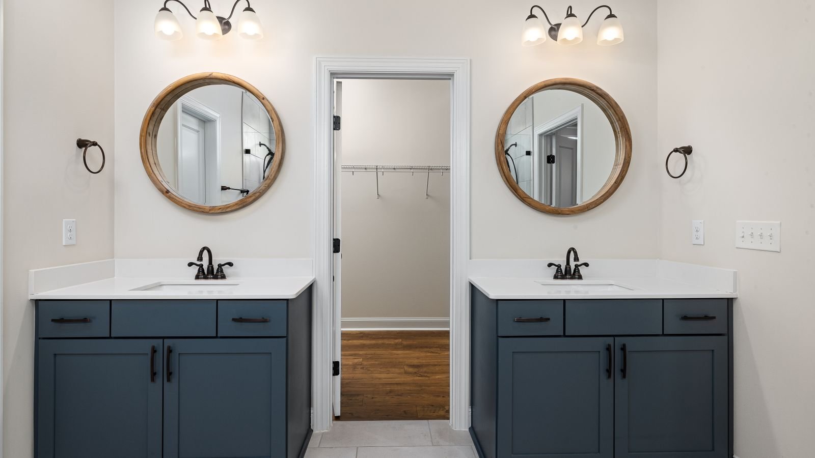 Clean bright bathroom with good ventilation and ceiling fixtures
