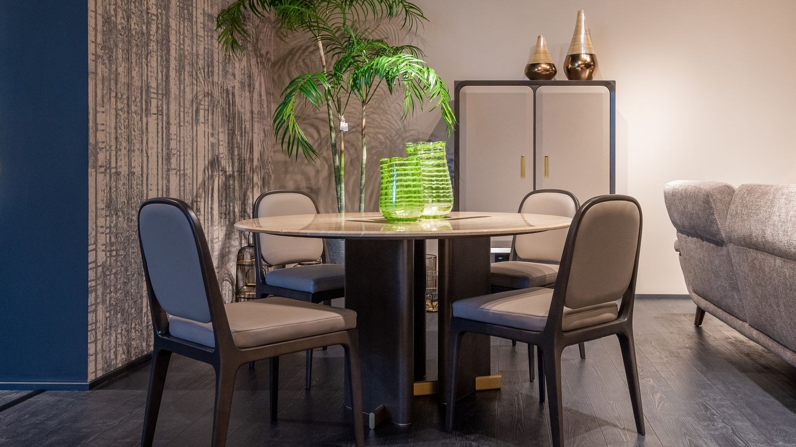 Upholstered fabric dining chairs around a wooden dining table