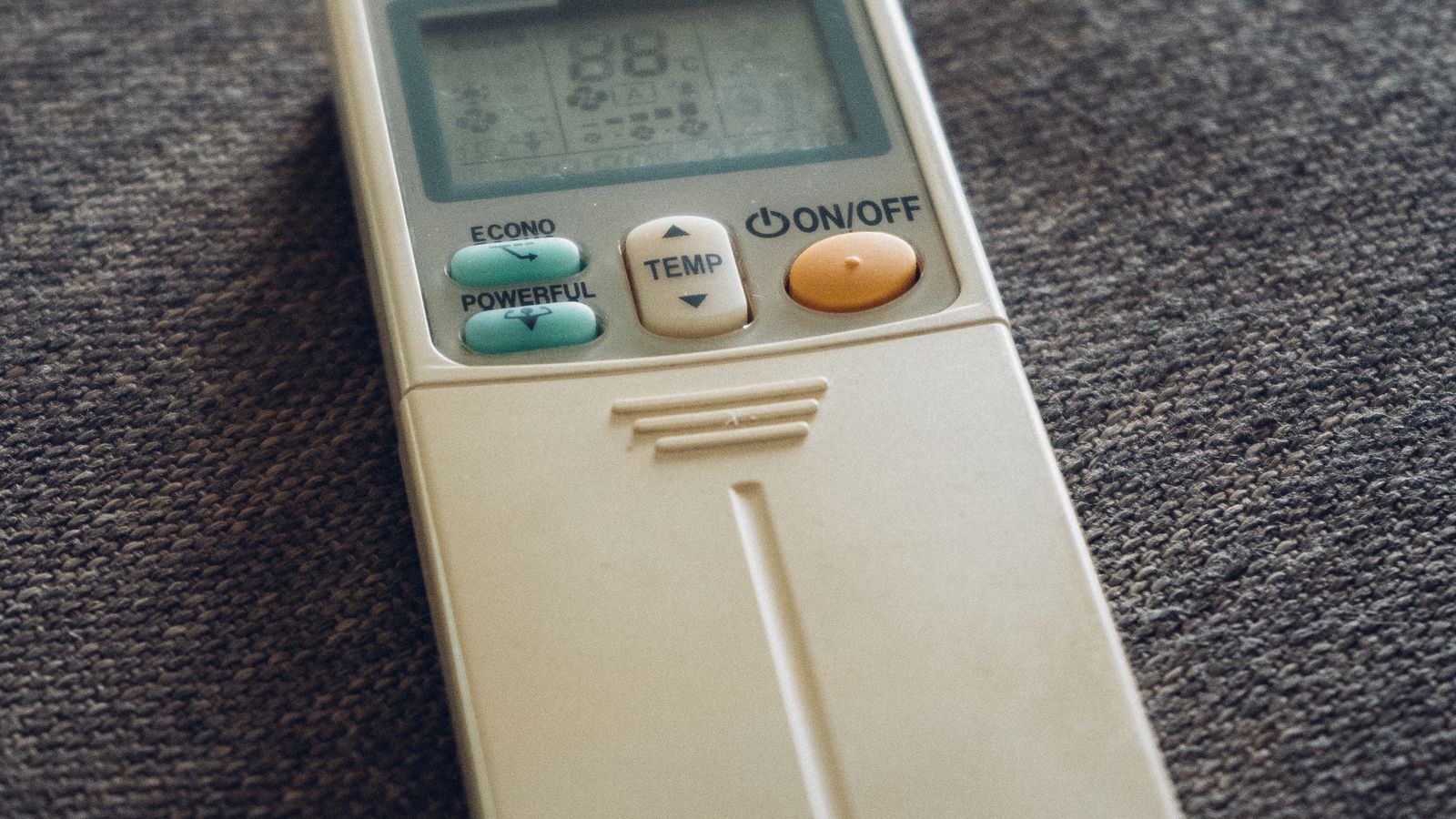 Air conditioner remote control used to check cooling mode and temperature settings