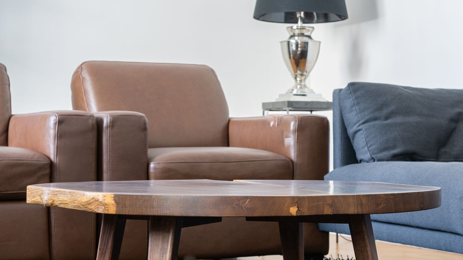 Reclining armchair with footrest extended in a living room