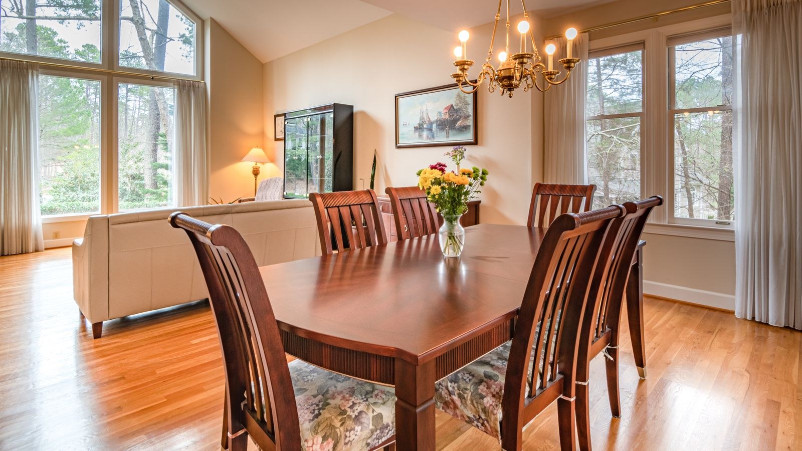 Wooden table and chairs in a dining room with a warm timber finish