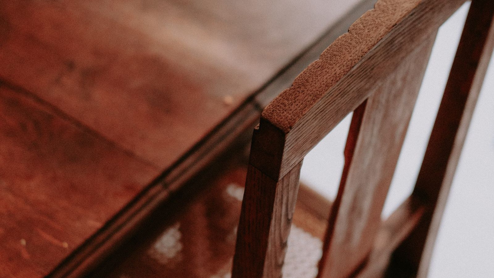 Wooden chair and table in a minimalist vintage styled room