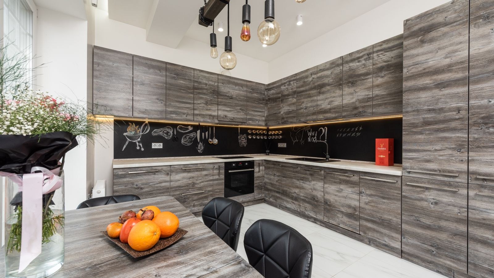 Kitchen cabinets with continuous hardwired LED task lighting
