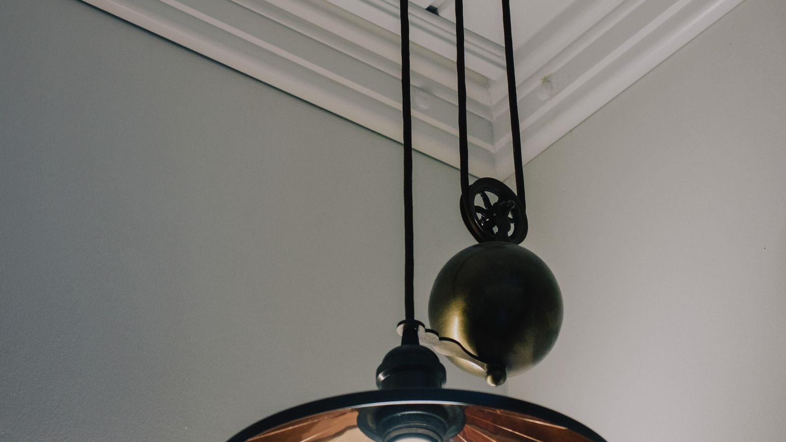 Ceiling light fixture mounting bracket and wiring in an electrical box