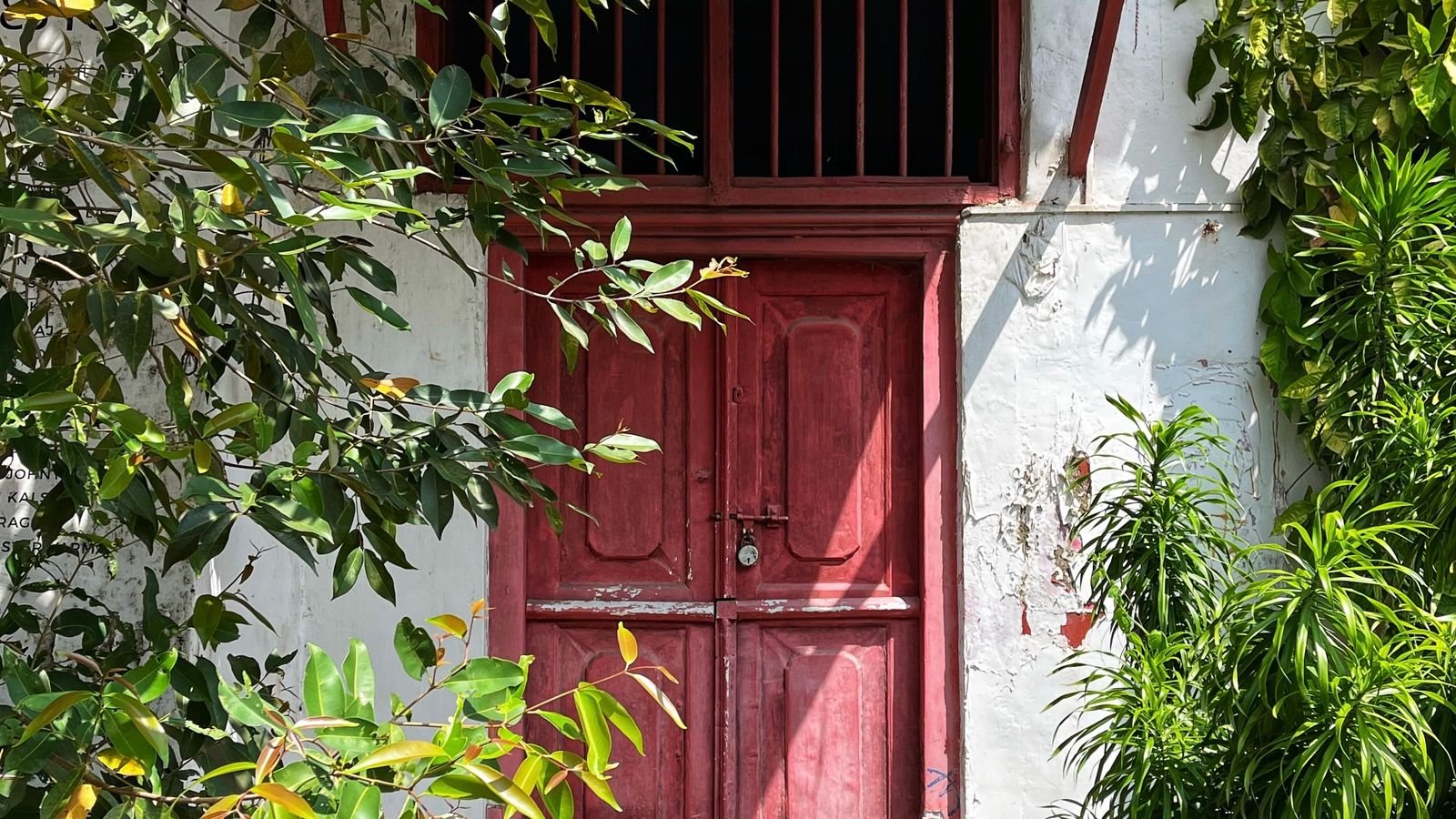Exterior entry doorway of a home with trim and threshold