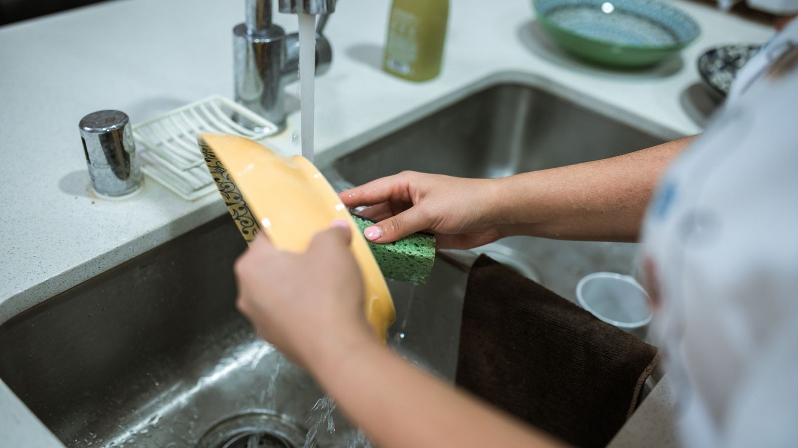 Clean dishes and cutlery drying after a dishwasher cycle