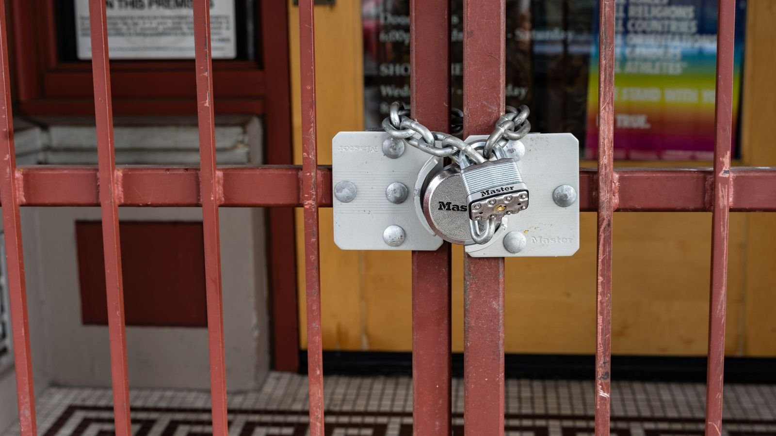 Close-up of a padlock shackle and dial during a combination reset