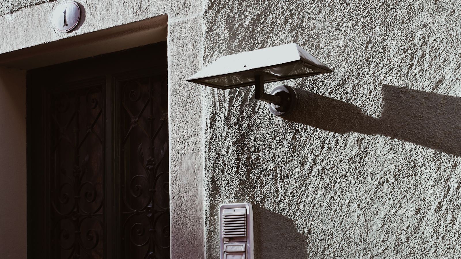 Person checking doorbell camera motion recordings on a smartphone app