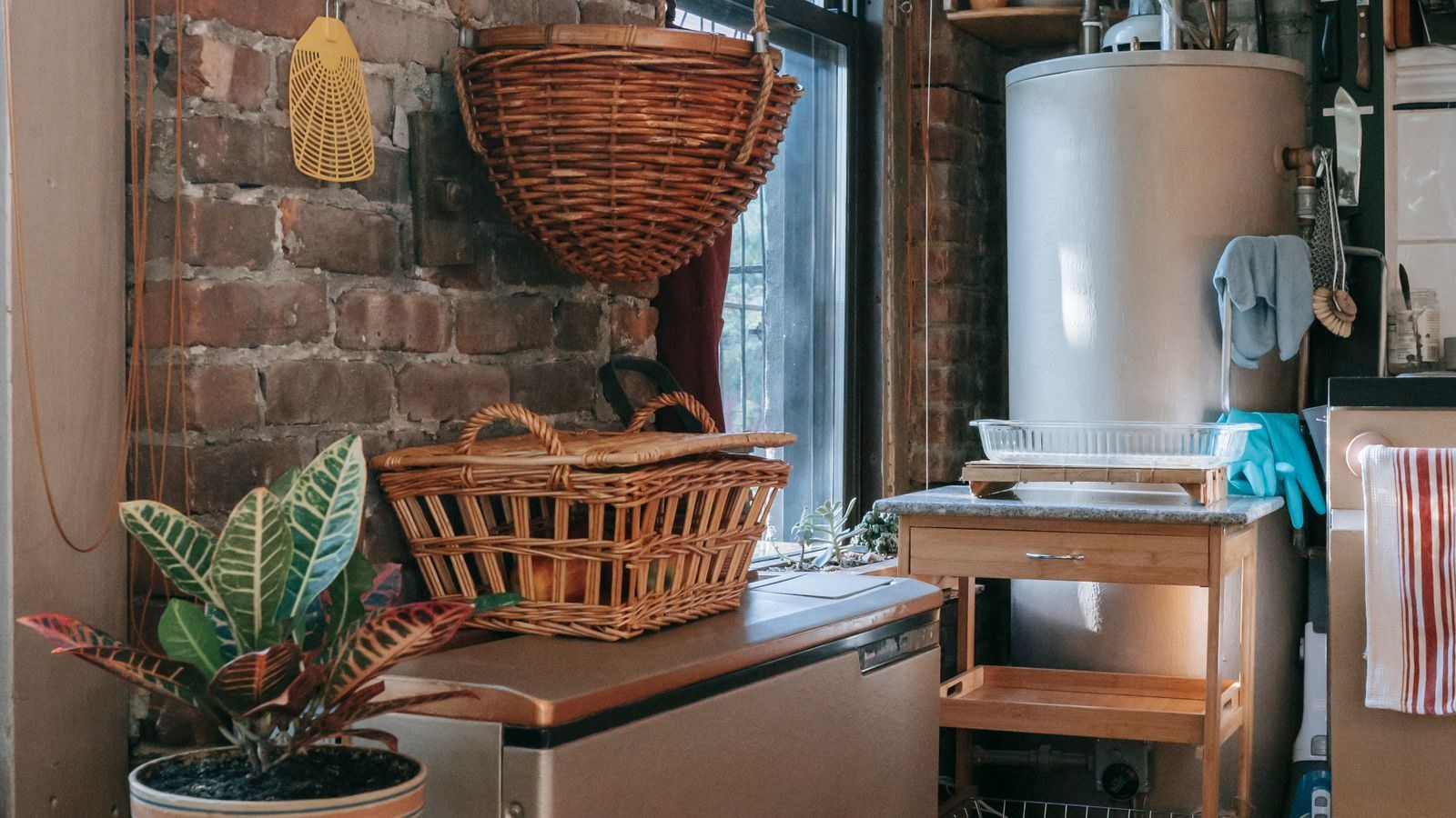 Basement utility room with brick walls where a dehumidifier can be positioned