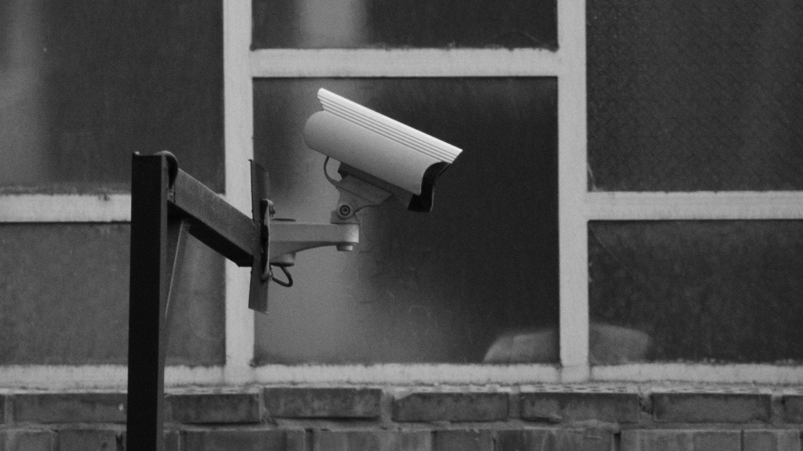 Person adjusting security camera activity zone settings in a smartphone app