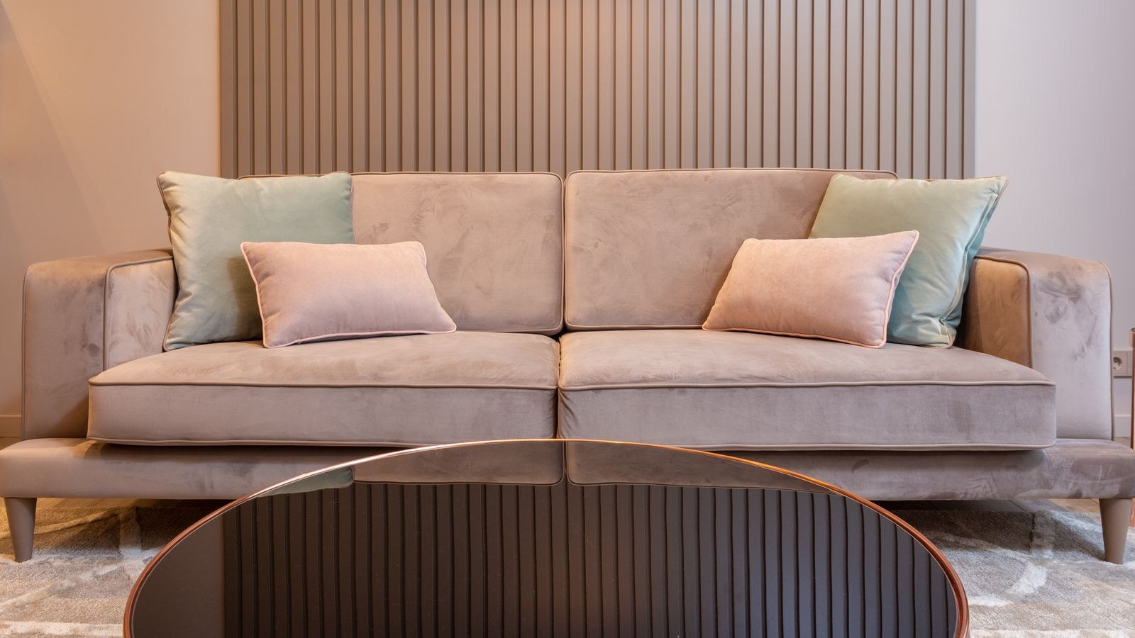 Stylish living room with a cozy couch and round coffee table on a hard floor