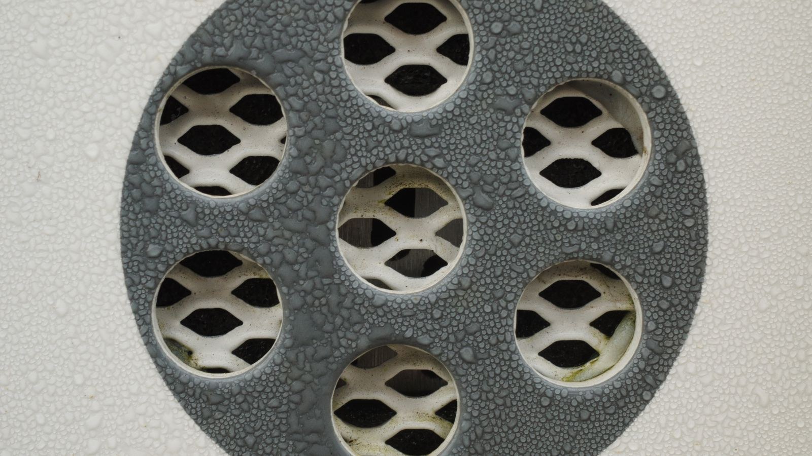 Water droplets condensing on a cold surface as a sign of high indoor humidity