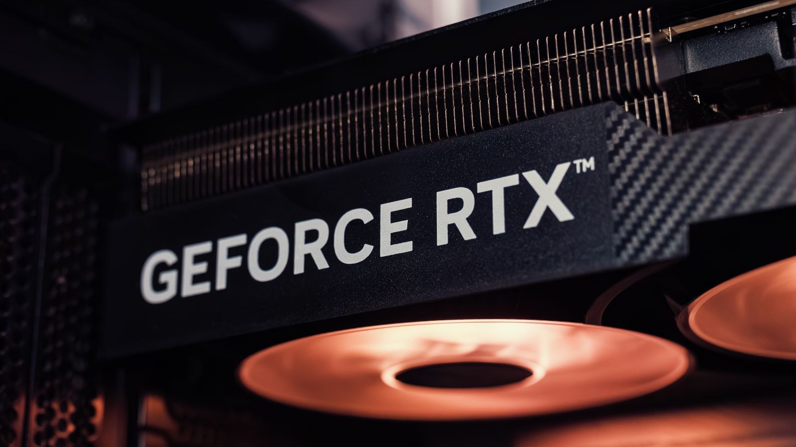 Close-up of a graphics card seated in a PCIe slot inside a gaming PC
