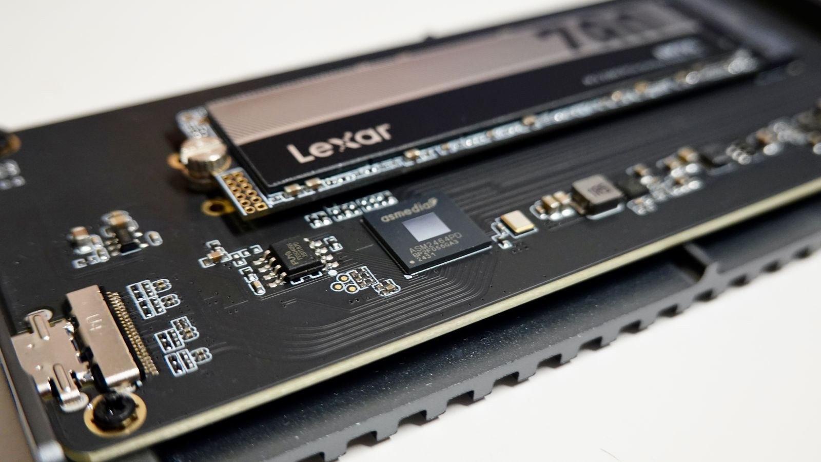 NVMe SSD installed on a motherboard M.2 slot with circuit board detail