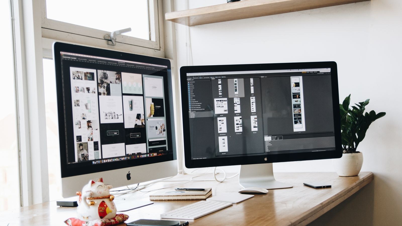 Clean organized desk workspace with two monitors and office supplies