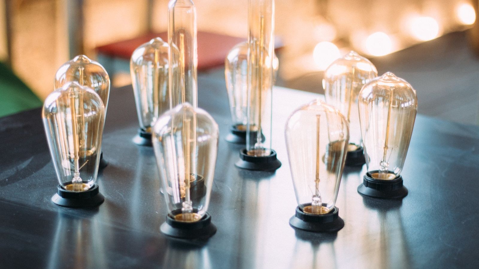 Decorative globe and candle shaped bulbs in a pendant fixture