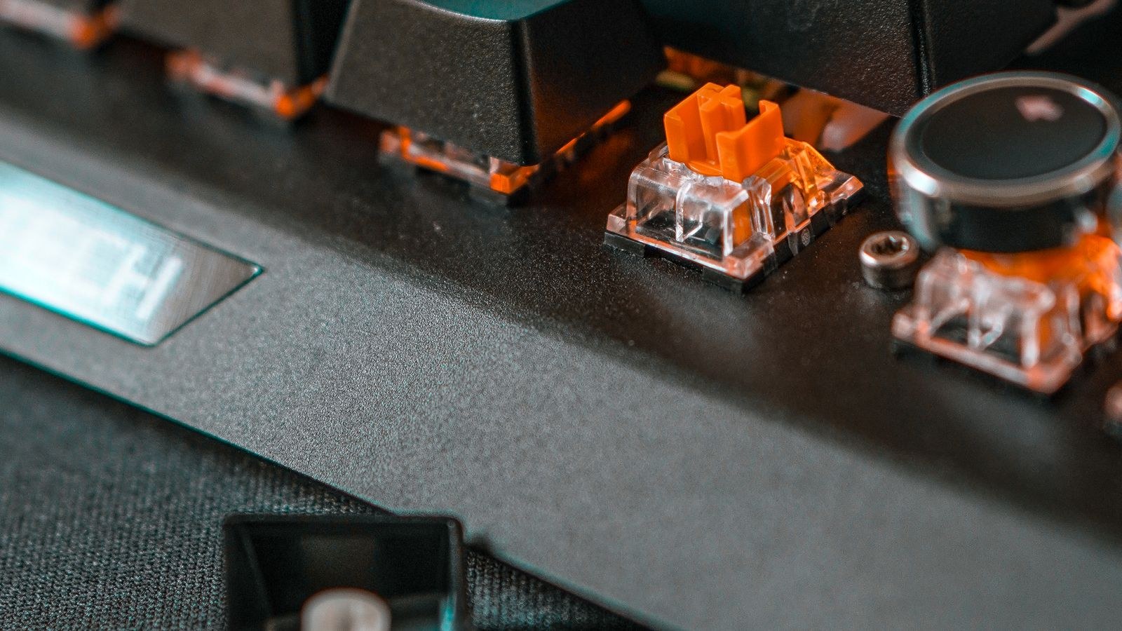 Close up of a mechanical keyboard with exposed switches and no keycaps