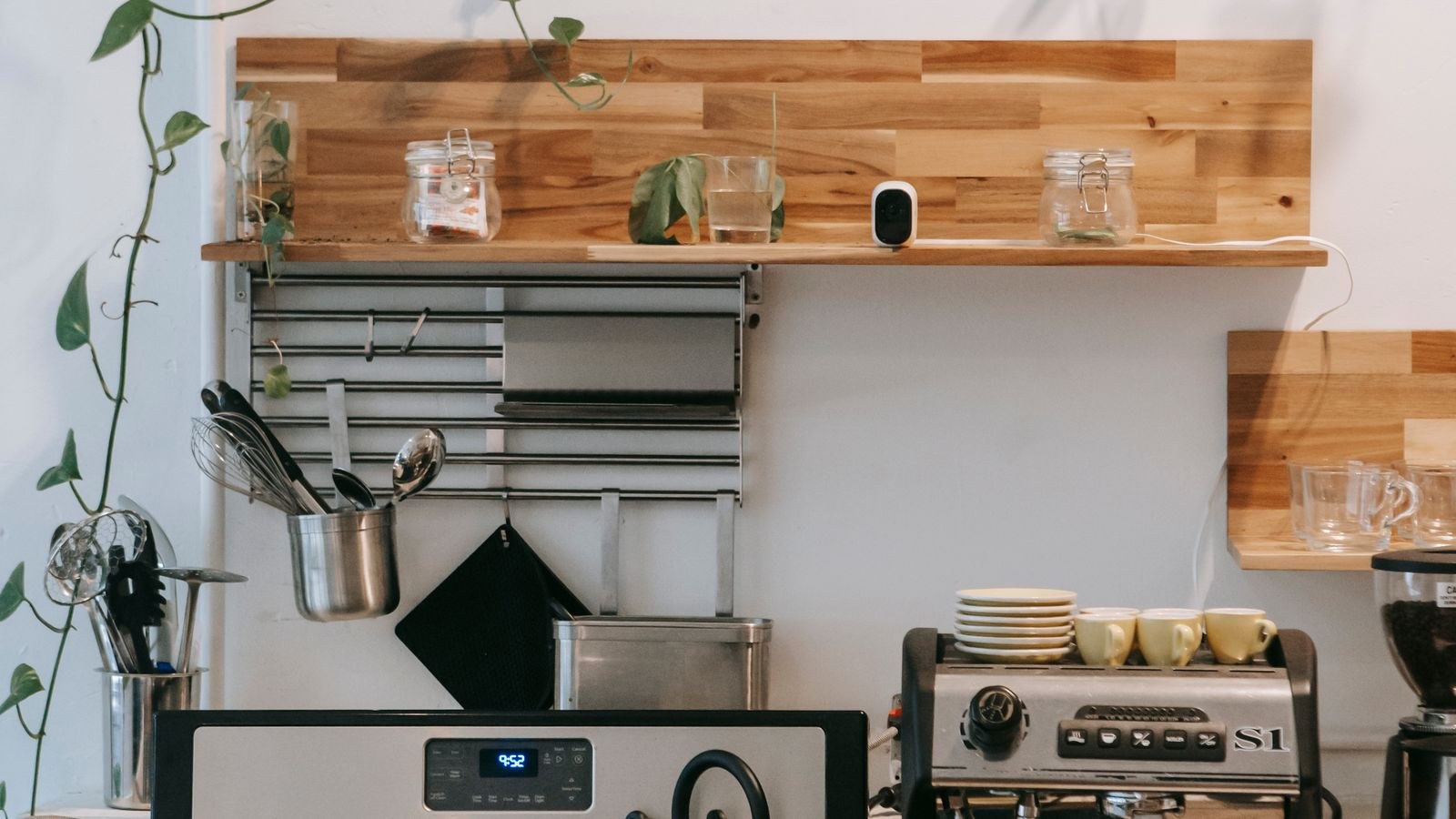 Modern kitchen with several countertop appliances connected to wall outlets
