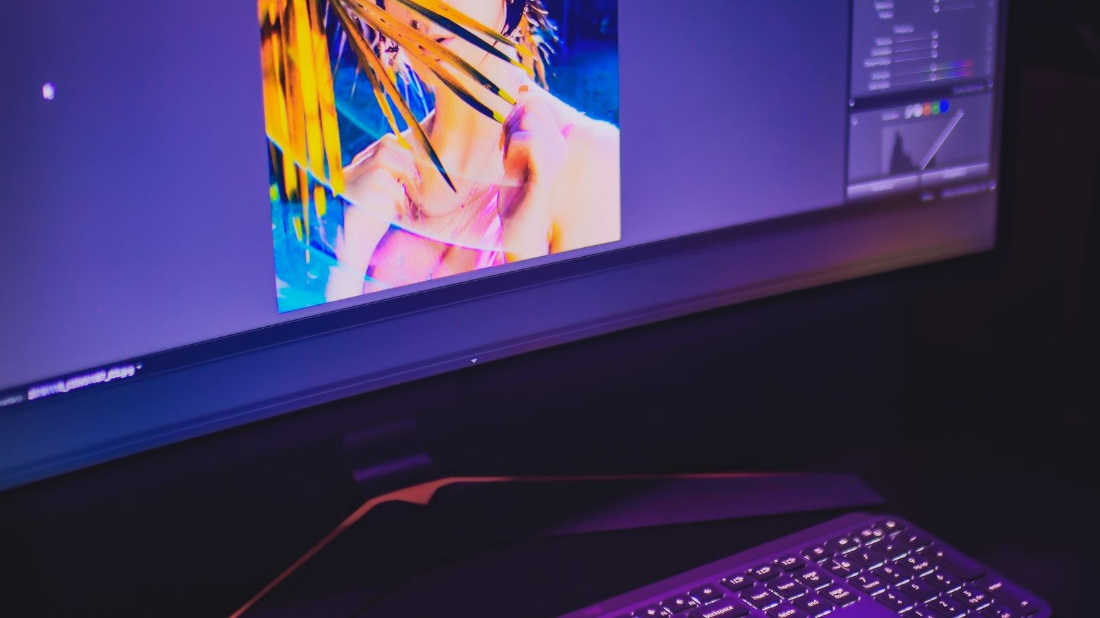 Creative studio workstation with dual monitors used for photo retouching